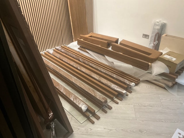 Timber and sauna components organised before installation