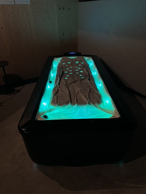 Illuminated dry flotation bed at the Google London wellbeing facility