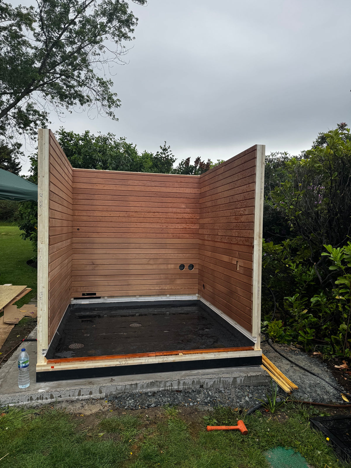 Timber-lined sauna walls during on-site assembly