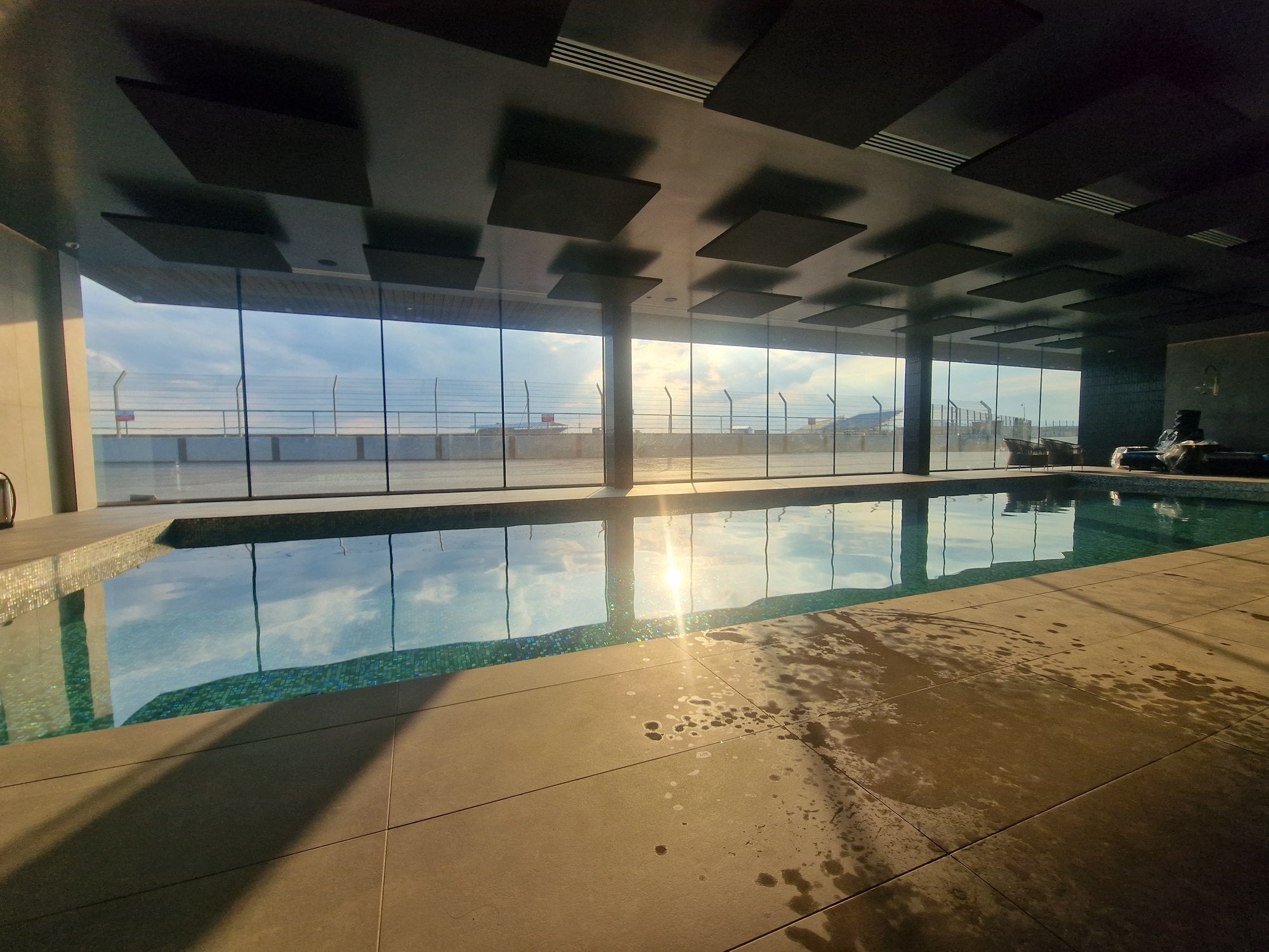 Sunlight reflected across pool water