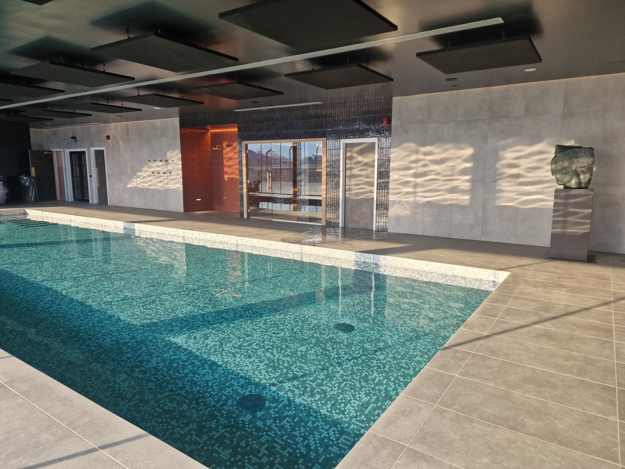 Indoor pool and adjoining wellness space
