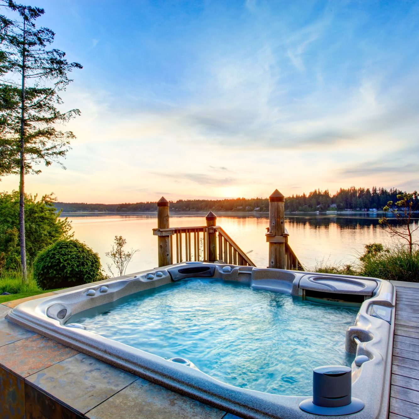 Lakeside hot tub at sun set