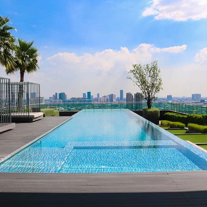 Large swimming pool on the rooftop of hotel